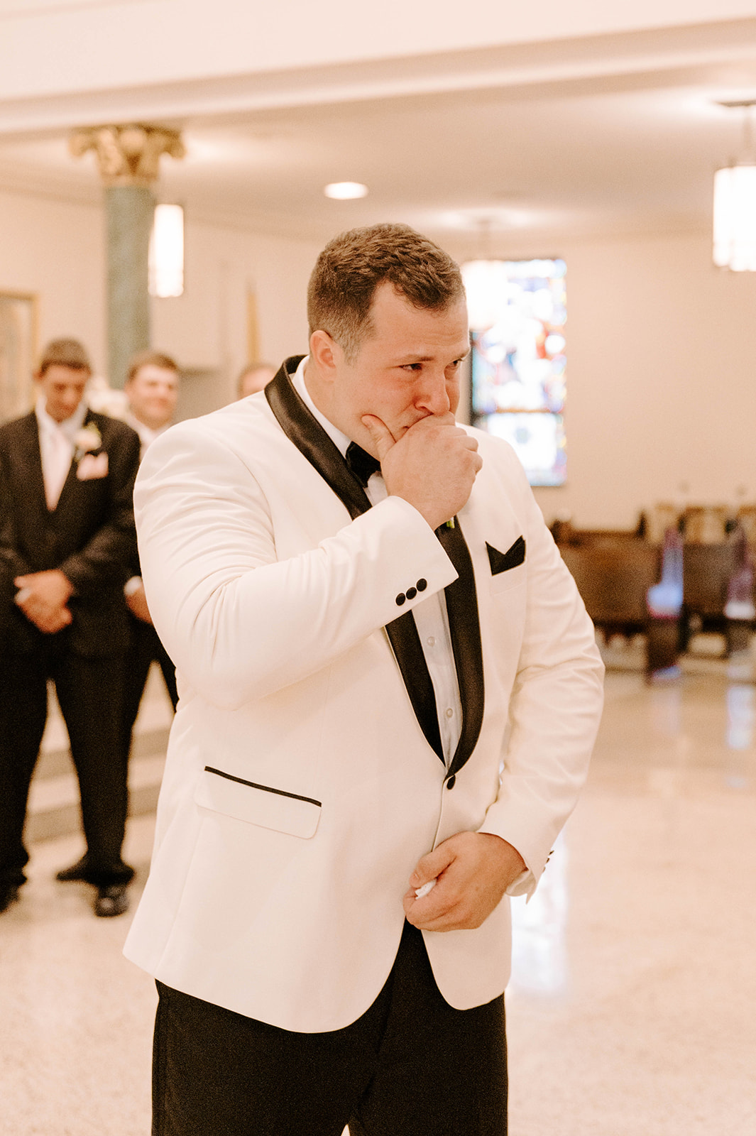 Groom crying when seeing his bride for the first time.